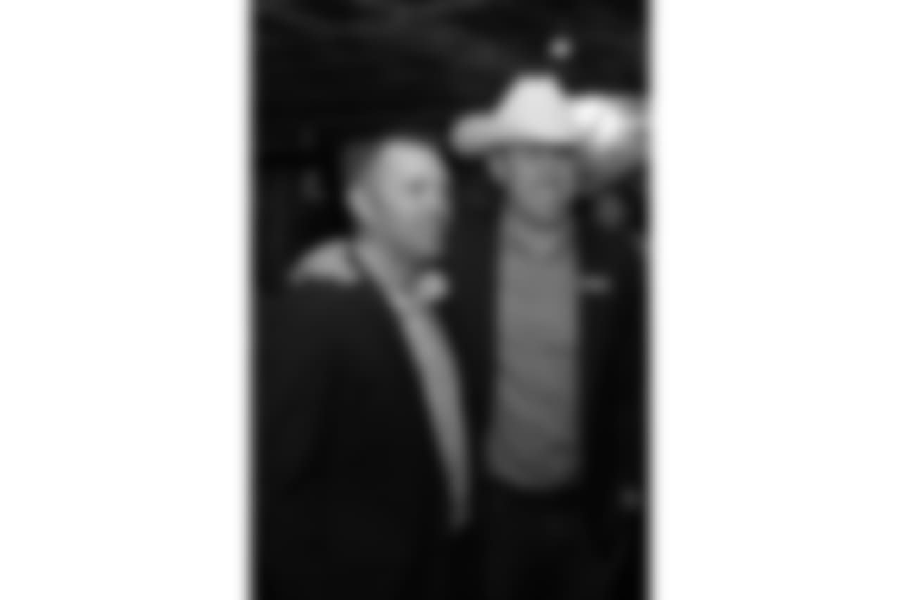 Case Keenum poses with a guest during Von's Vision at Mile High Station in Denver on November 5, 2018.