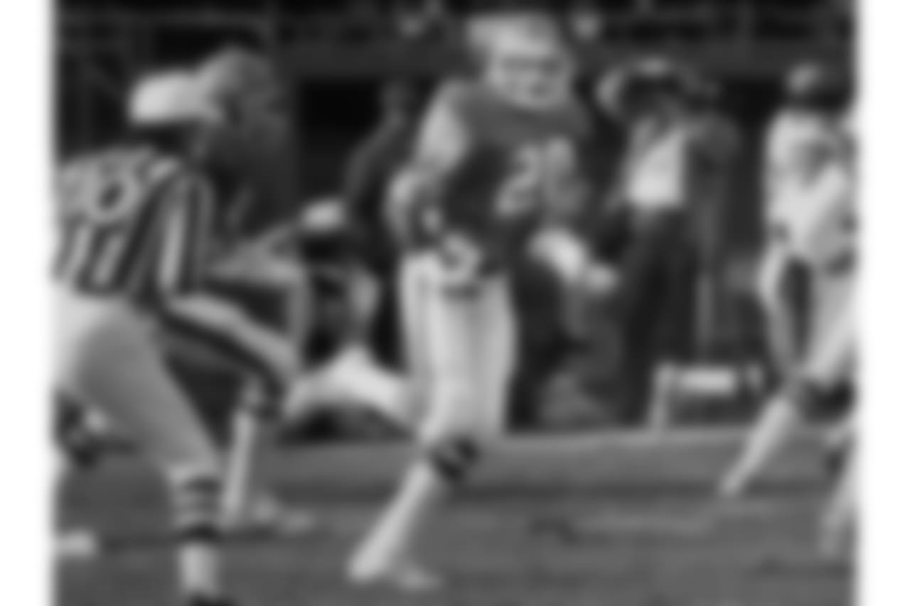 Cornerback Louis Wright returns an intercepted pass during a November 17, 1985 overtime win (30-24) against the San Diego Chargers at Mile High Stadium.