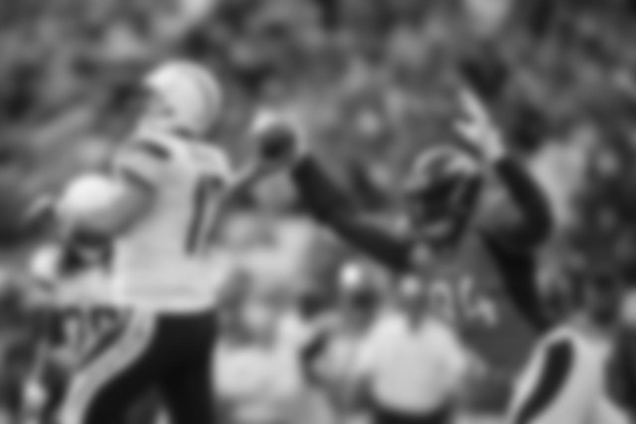 Denver Broncos linebacker DeMarcus Ware (94) knocks the ball out of San Diego Chargers quarterback Philip Rivers' (17) hand during second quarter action against the San Diego Chargers during the game at Sports Authority Field at Mile High in Denver, CO, October 30, 2016.
Photo by Gabriel Christus