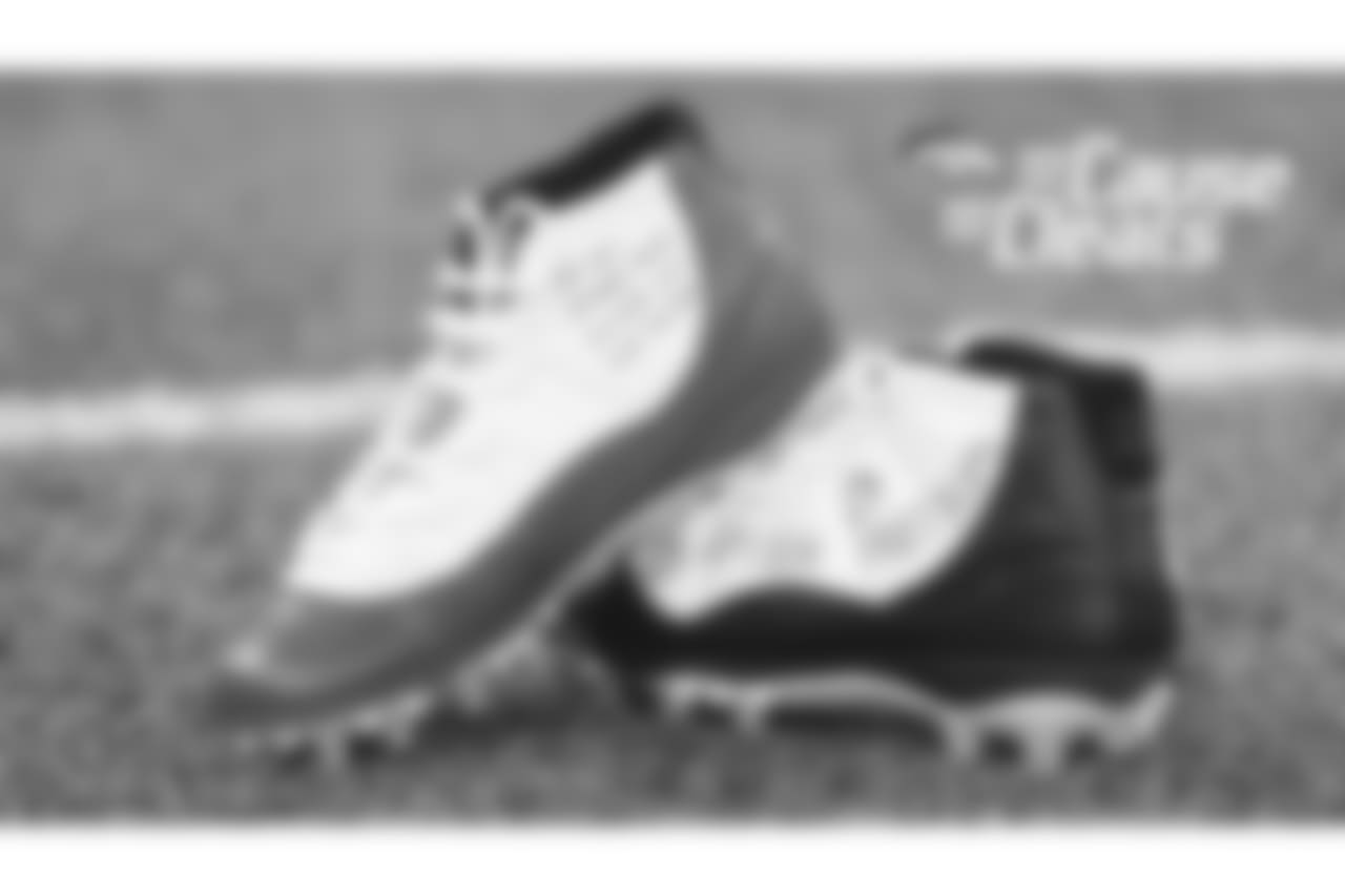 DeMarcus Walker's cleats represent Children's Hospital Colorado and were designed by children from the hospital for My Cause My Cleats in 2018.