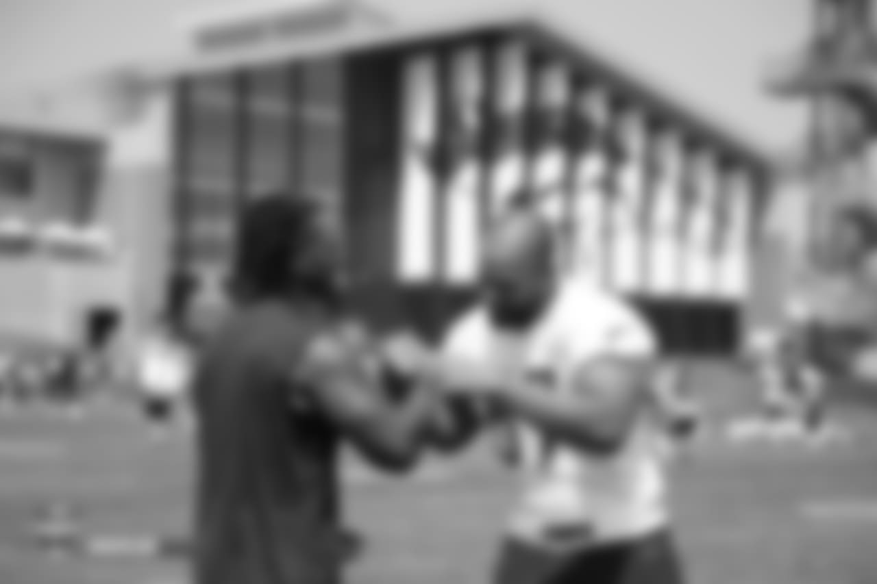 Todd Davis and former Broncos LB Kasim Edebali during training camp at UCHealth Training Center in Centennial, CO, August 16, 2018.
Photo by Gabriel Christus