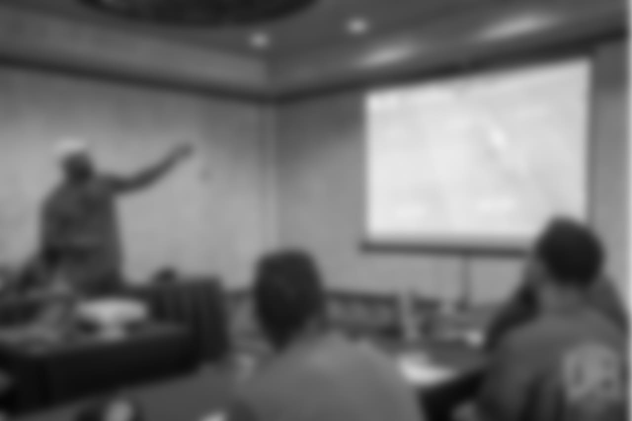 Von Miller reviews player film at Von Miller's Pass Rush Summit, which included hands-on instruction and drills, on June 28, 2018.