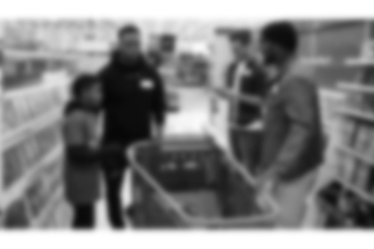 Brandon Marshall and Keishawn Bierria during Will Parks' shopping spree for the Boys & Girls Club of Metro Denver on Dec. 3, 2018