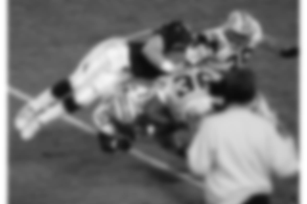 The Helicopter: John Elway's daring run and the contact he absorbed for a first down made for one of the most memorable Super Bowl moments in NFL history.