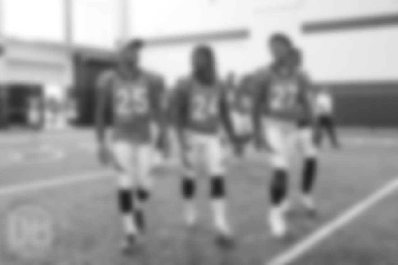 Chris Harris Jr., Adam Jones and Brendan Langley at team photo day at UCHealth Training Center on September 15, 2018.