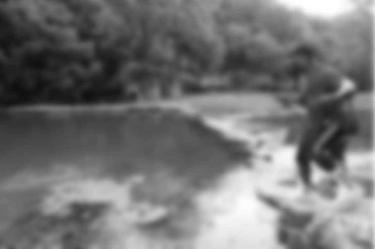 Von Miller tries his hand at fly fishing at the fishing portion of Von Miller's Pass Rush Summit at Dogwood Canyon Nature Park on June 28, 2018.