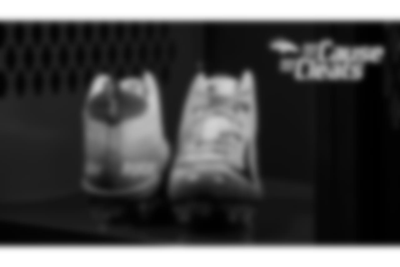 Josey Jewell's cleats represent Logan's Hope, which is for a boy named Logan who has Duchenne muscular dystrophy that Jewell met at Iowa, for My Cause My Cleats in 2018.