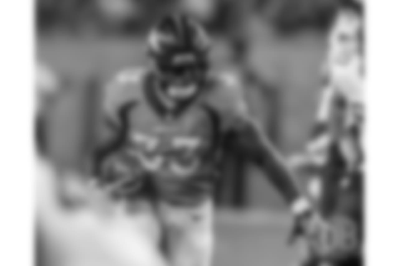 Running back De'Angelo Henderson Sr. (33) during action against the Minnesota Vikings during the NFL game at Broncos Stadium in Denver Colo. August 11, 2018.
