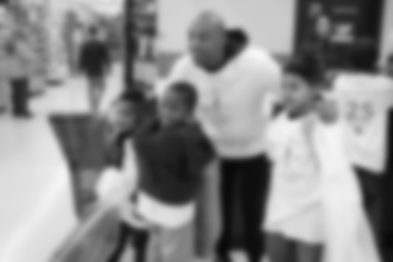 Chris Harris Jr. hosts his 2018 "Shop with a Jock" event, in which he gives 50 children a shopping spree and dinner.