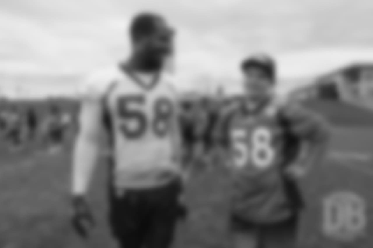 TJ, a 12-year-old fighting cystic fibrosis, wanted to be Von Miller for a day, and the Make-A-Wish Foundation helped make that dream come true on September 29, 2018. Here, TJ meets Miller after practice.