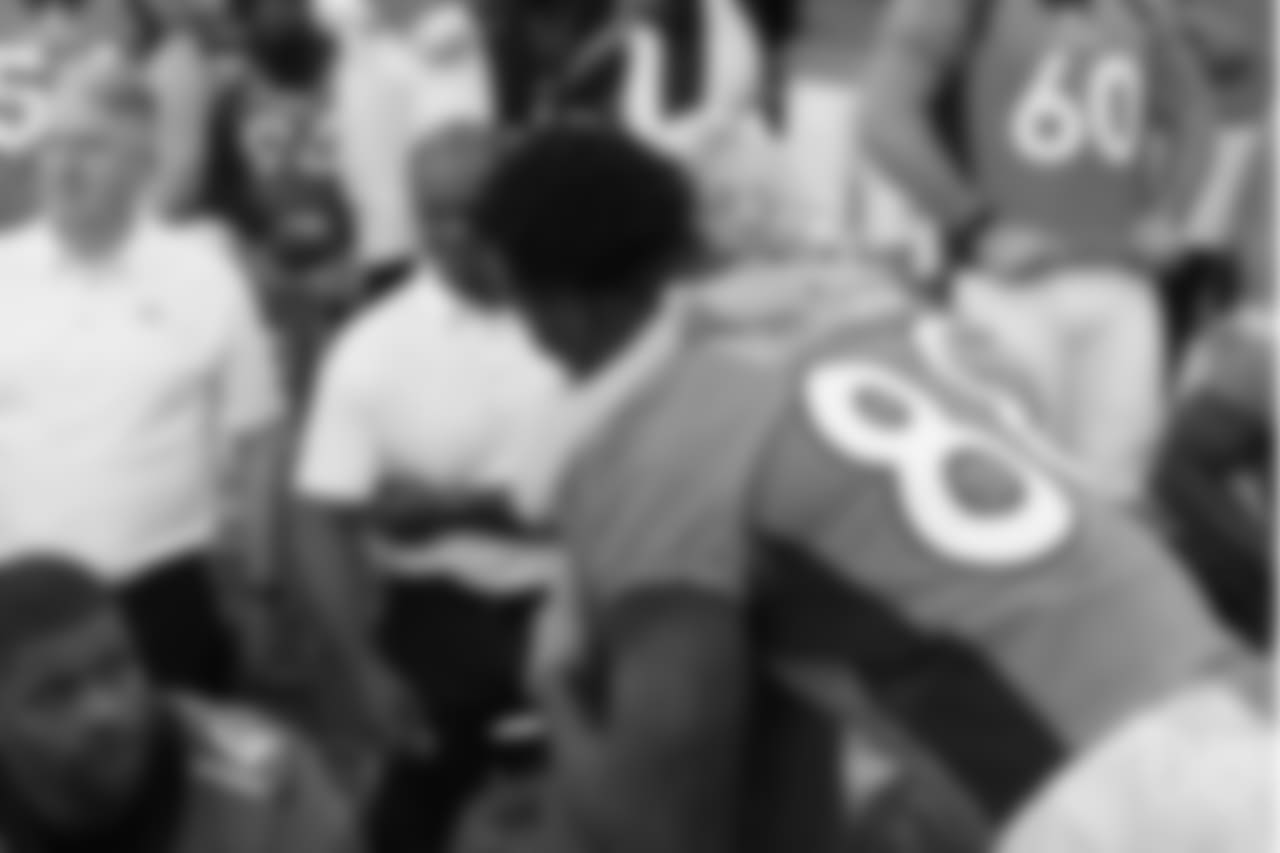 Annabel Bowlen, representing Broncos Owner Pat Bowlen, hugs Denver Broncos wide receiver Demaryius Thomas (88) before the team photo on Oct. 4, 2017.