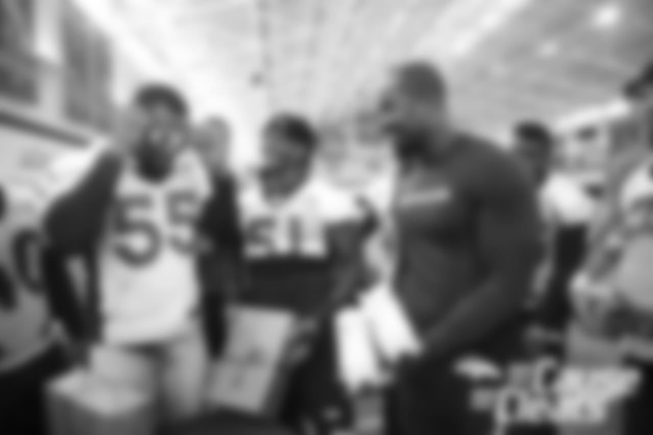 Von Miller shows off his custom cleats during the 2018 My Cause My Cleats unveiling for the players.