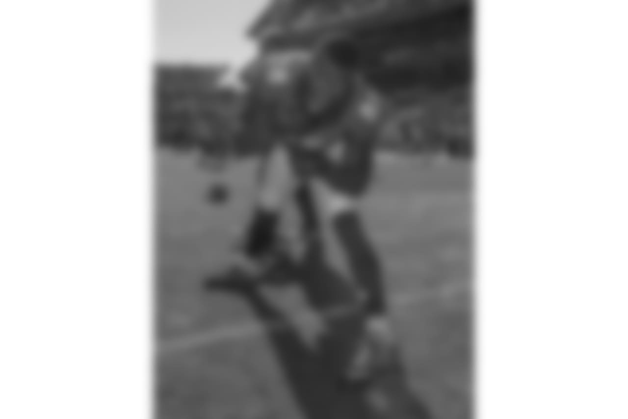 Demaryius Thomas points to the camera while he stretches before a game against the Washington Redskins on Oct. 27, 2013.