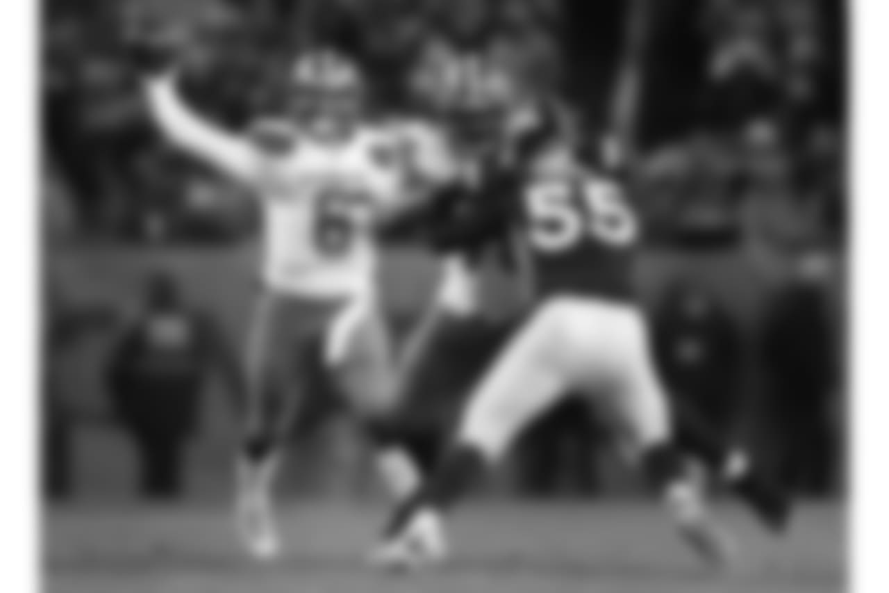 Cleveland Browns quarterback Baker Mayfield (6) throws as Denver Broncos outside linebacker Bradley Chubb (55) pursues during the second half of an NFL football game, Saturday, Dec. 15, 2018, in Denver. (AP Photo/Jack Dempsey)