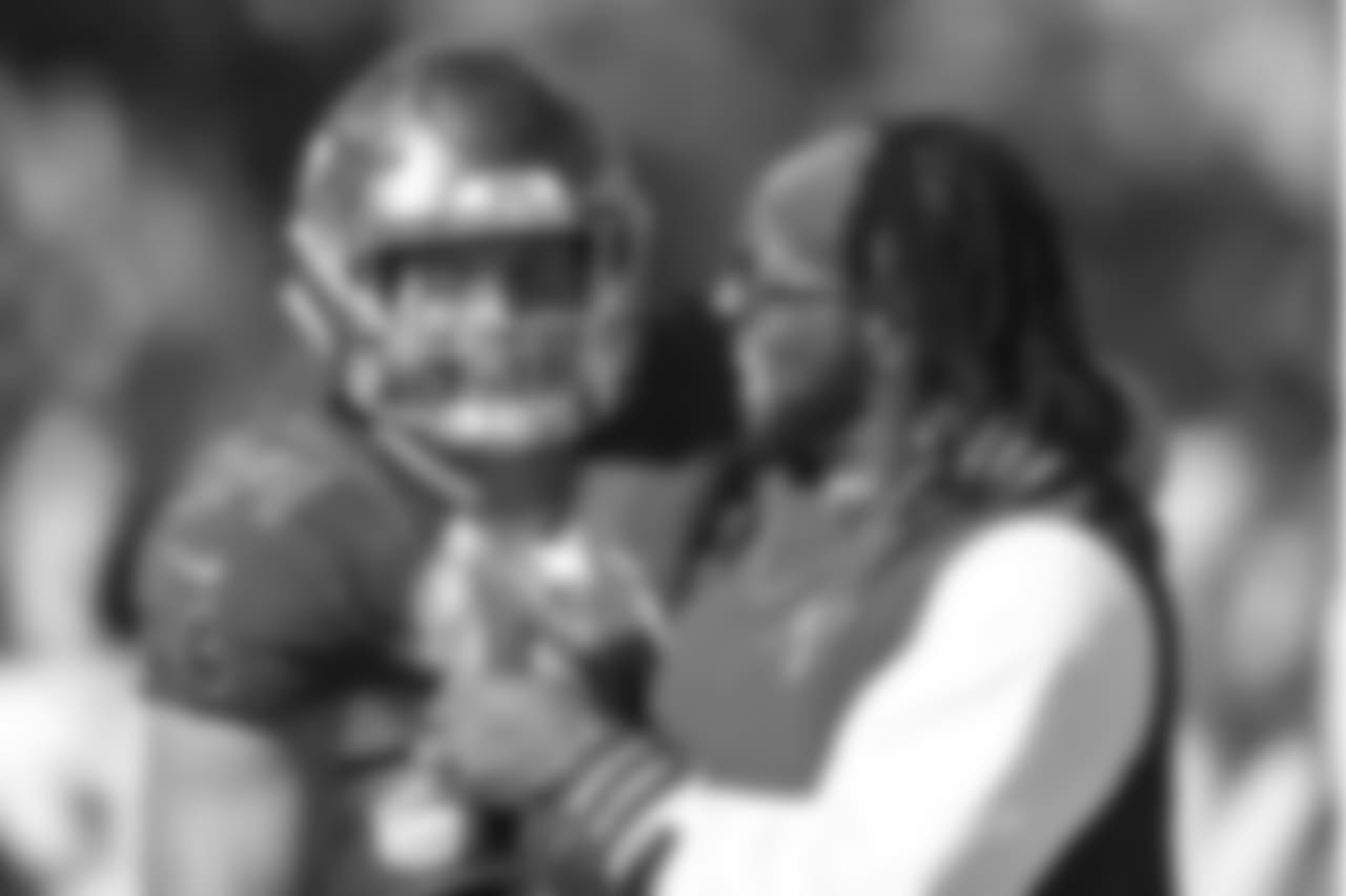 K Chandler Catanzaro, No. 7 and DT Gerald McCoy, No. 93