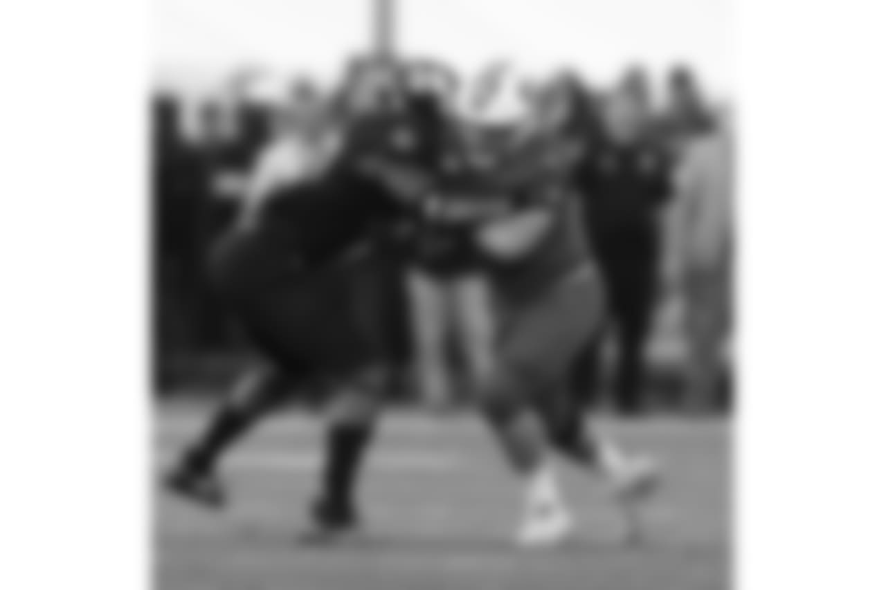 South outside linebacker Gerri Green of Mississippi State (40) tackles North fullback Alec Ingold of Wisconsin (45) as he carries the ball during the second half of the Senior Bowl college football game, Saturday, Jan. 26, 2019, in Mobile, Ala. (AP Photo/Butch Dill)