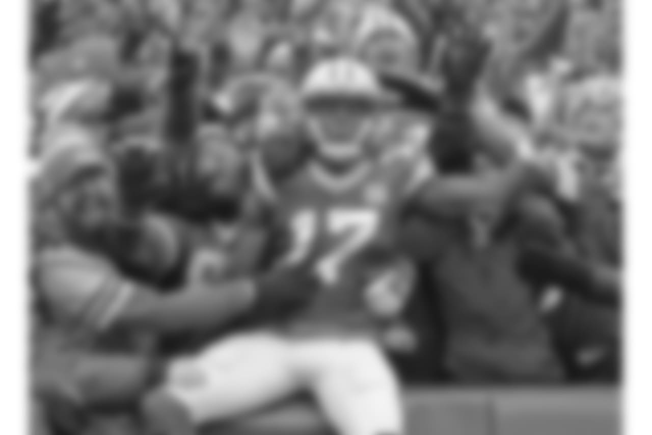 Green Bay Packers wide receiver Davante Adams (17) celebrates after scoring a touchdown against the Arizona Cardinals during the first half of an NFL football game Sunday, Dec. 2, 2018, in Green Bay, Wis.