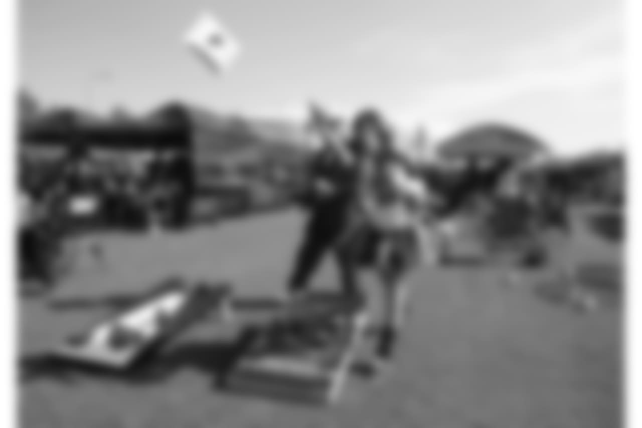 Arizona Cardinals fans tailgate prior to an NFL football game against the Oakland Raiders, Sunday, Nov. 18, 2018, in Glendale, Ariz.