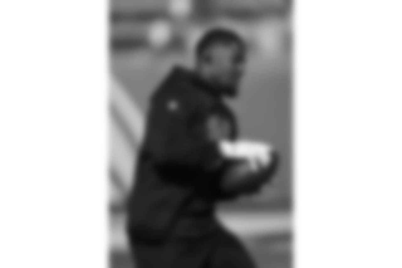 Arizona Cardinals running back David Johnson warms up before the start of an football game against the Los Angeles Chargers Sunday, Nov. 25, 2018, in Carson, Calif.