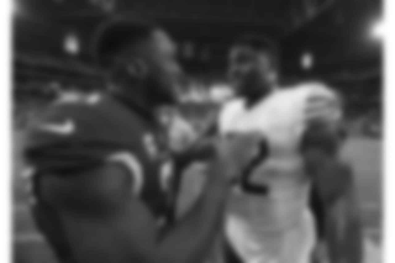 Arizona Cardinals defensive back Patrick Peterson (21) and Chicago Bears linebacker Khalil Mack (52) after an NFL football game, Sunday, Sept. 23, 2018, in Glendale, Ariz.