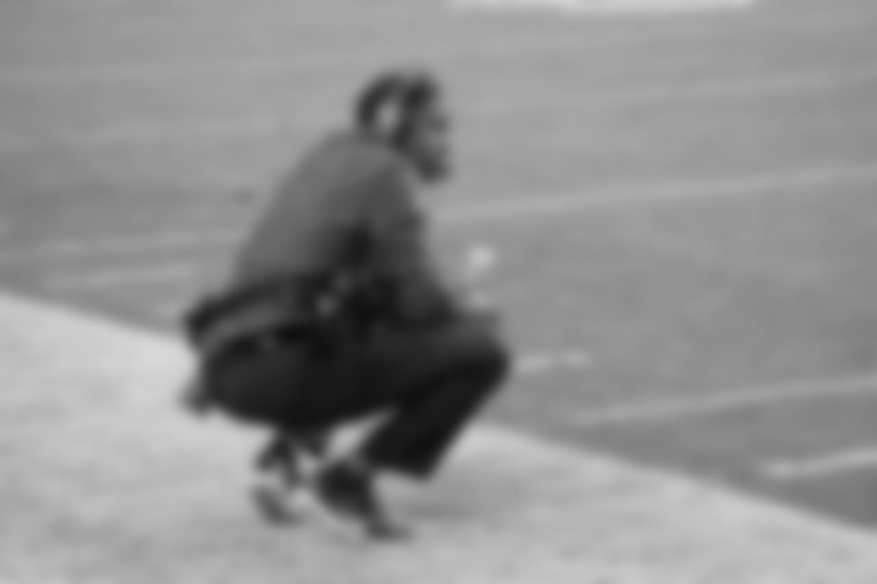 Cardinals head coach Steve Walks watches from the sideline