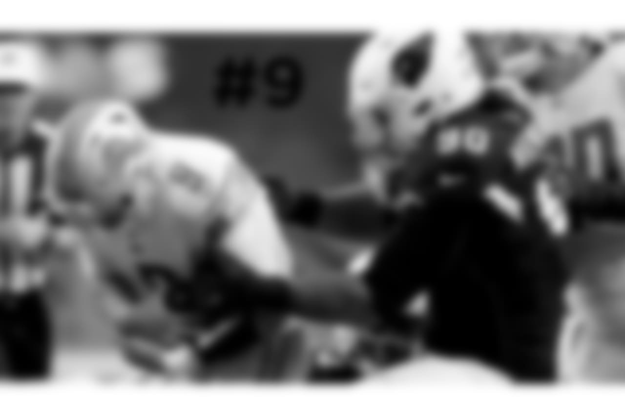 9\. Lions quarterback Matthew Stafford is hit by Cardinals defensive tackle Robert Nkemdiche