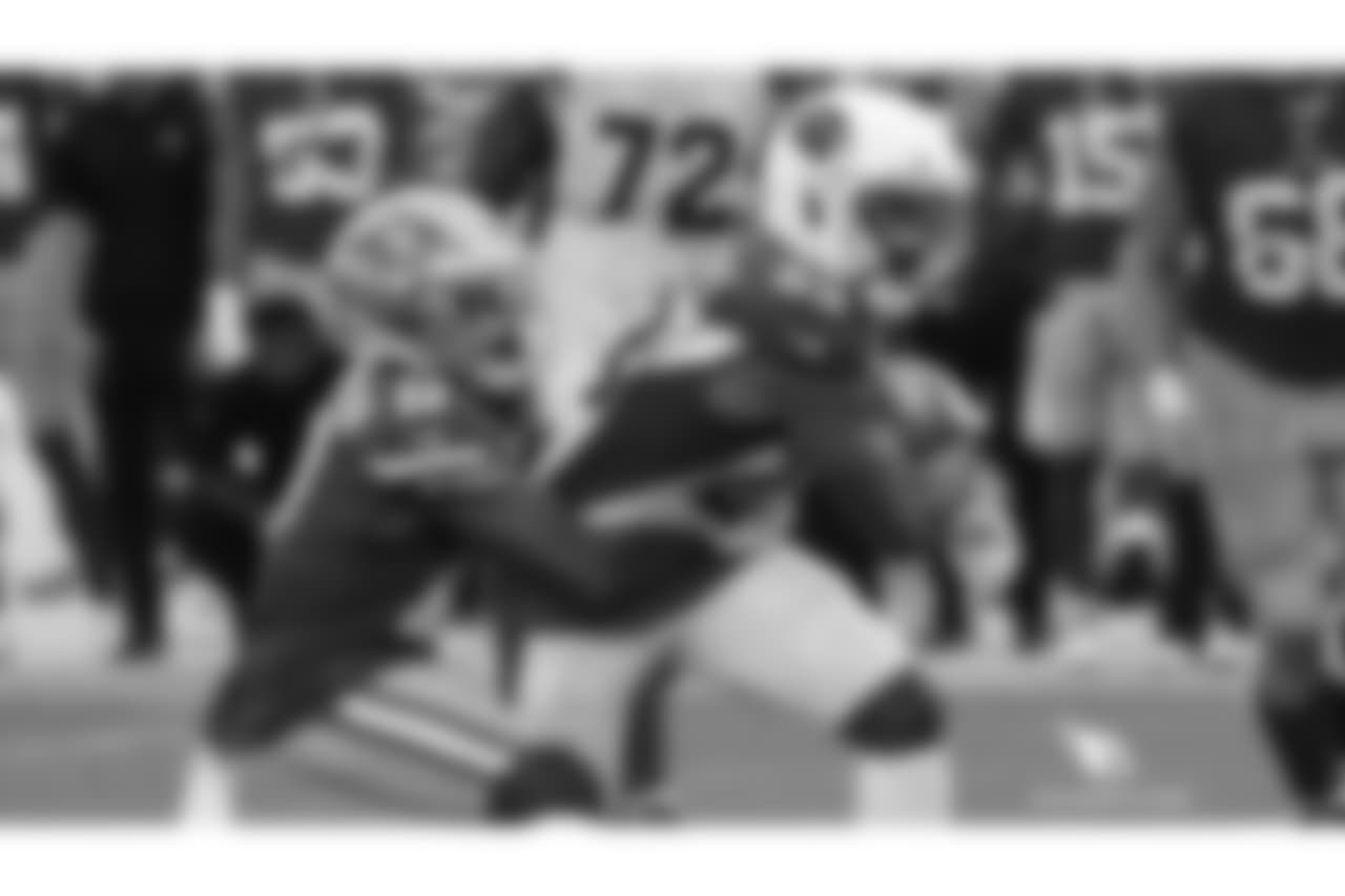 CB Bené Benwikere is tackled after his interception
