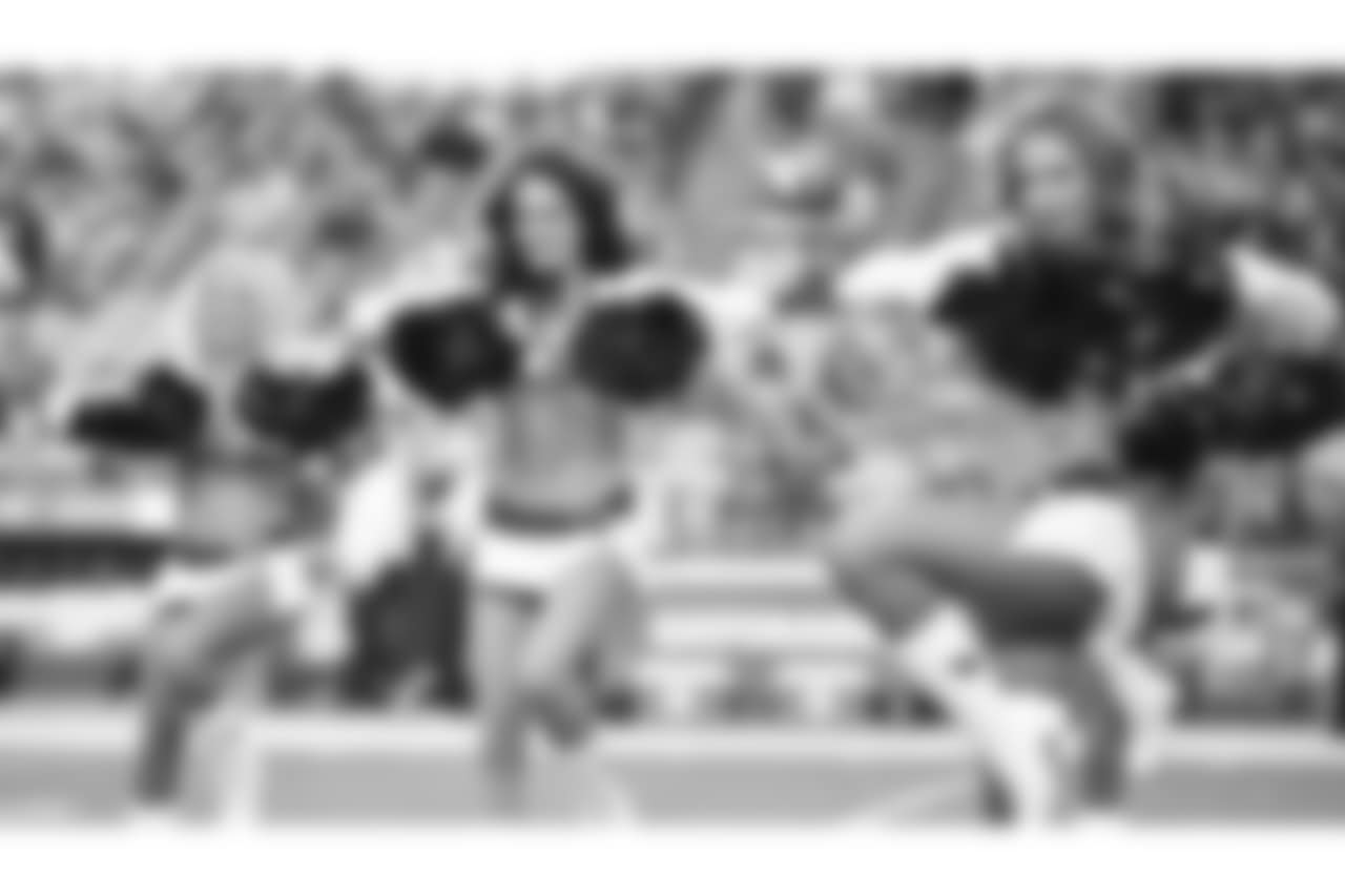 Images of the Cardinals cheerleaders during the Week 14 matchup against Detroit
