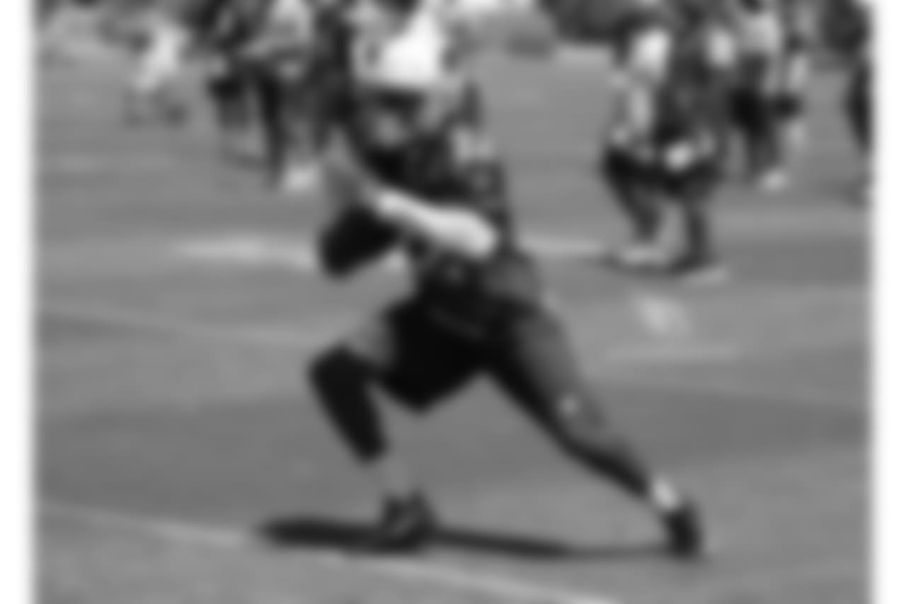 RB T.J. Logan