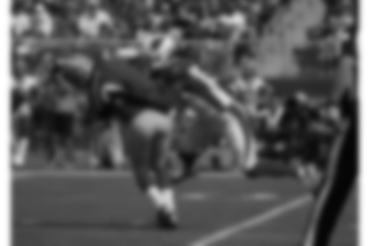 LB Josh Bynes lays a tough hit on 49ers QB C.J. Beathard