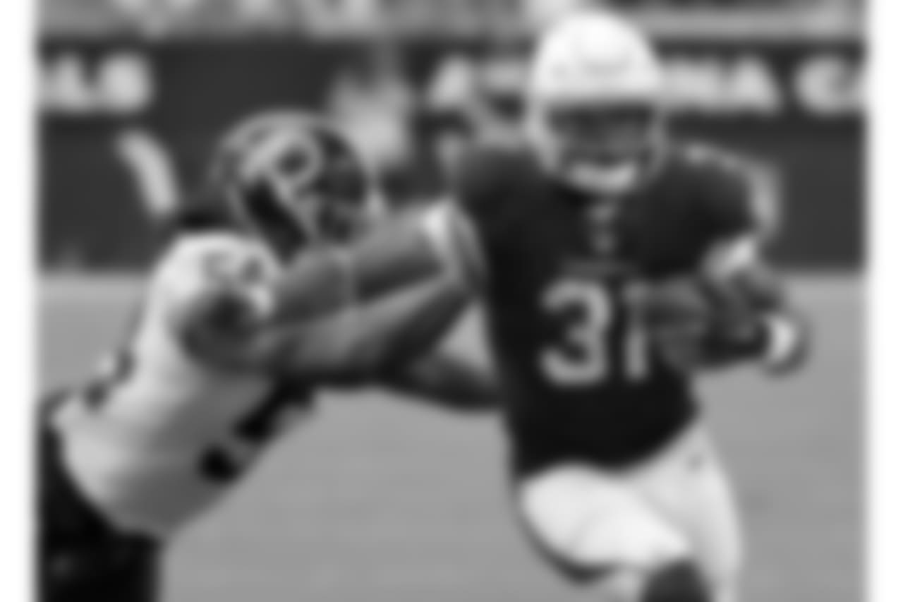 Cardinals running back David Johnson on the carry.