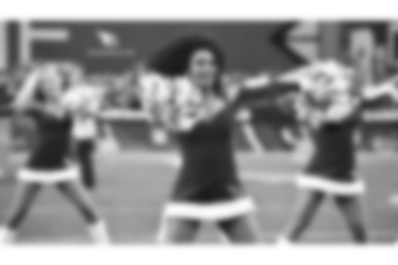 Images of the Cardinals cheerleaders during the Week 16 matchup at State Farm Stadium