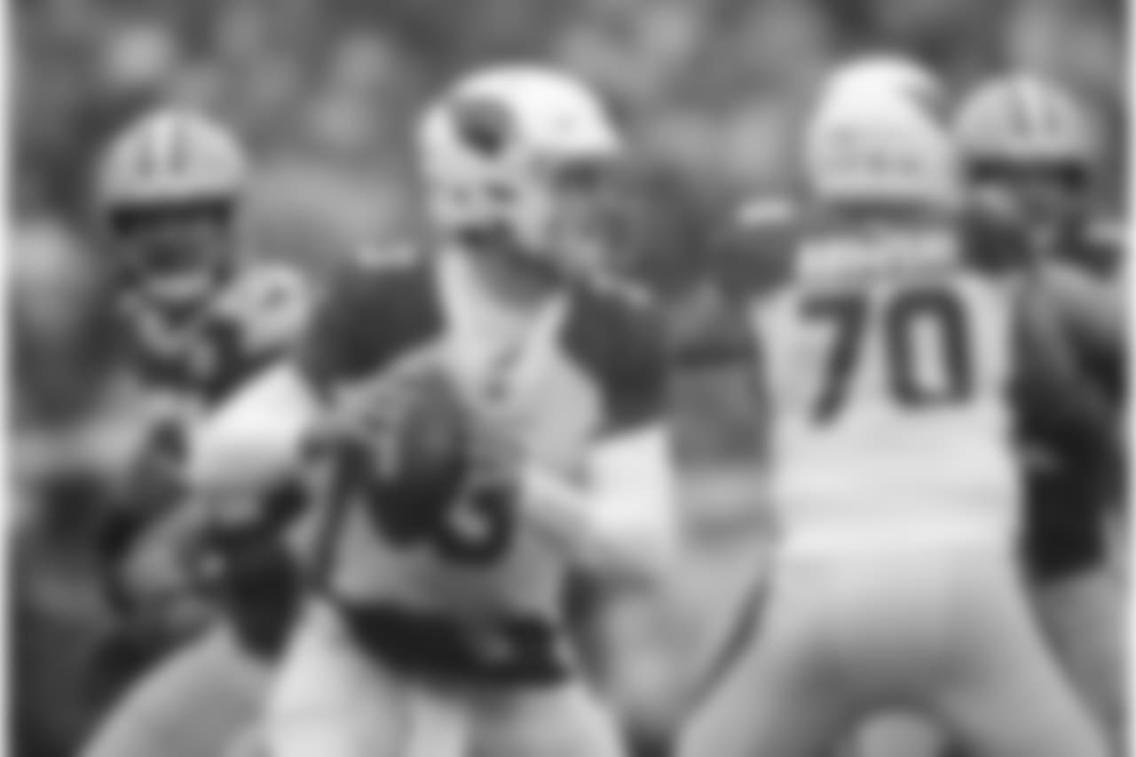 Arizona Cardinals quarterback Josh Rosen looks to pass during the first half of an NFL football game against the Green Bay Packers Sunday, Dec. 2, 2018, in Green Bay, Wis.