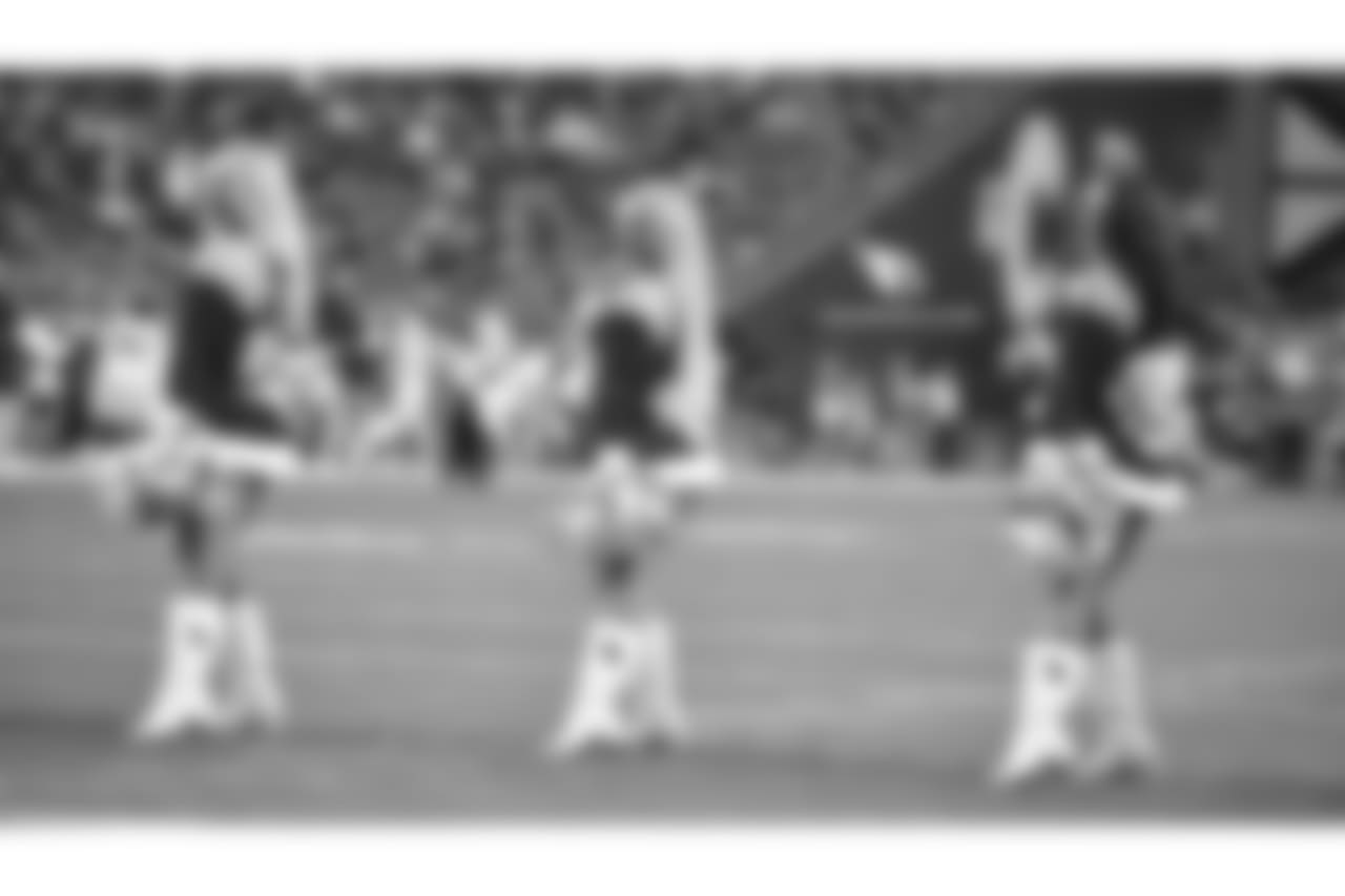 Images of the Cardinals cheerleaders during the Week 16 matchup at State Farm Stadium
