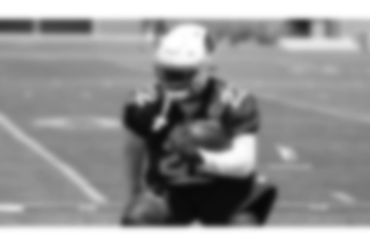 RB T.J. Logan