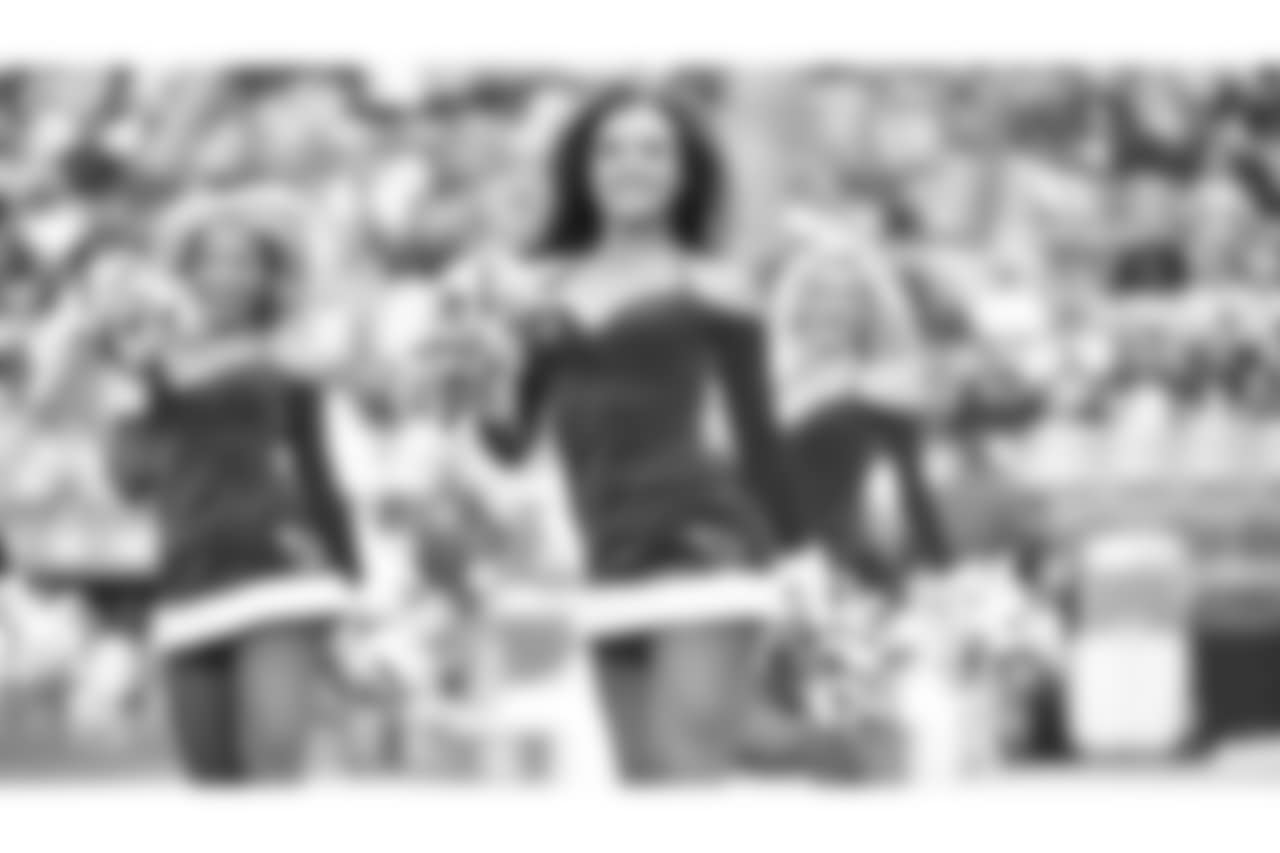 Images of the Cardinals cheerleaders during the Week 16 matchup at State Farm Stadium
