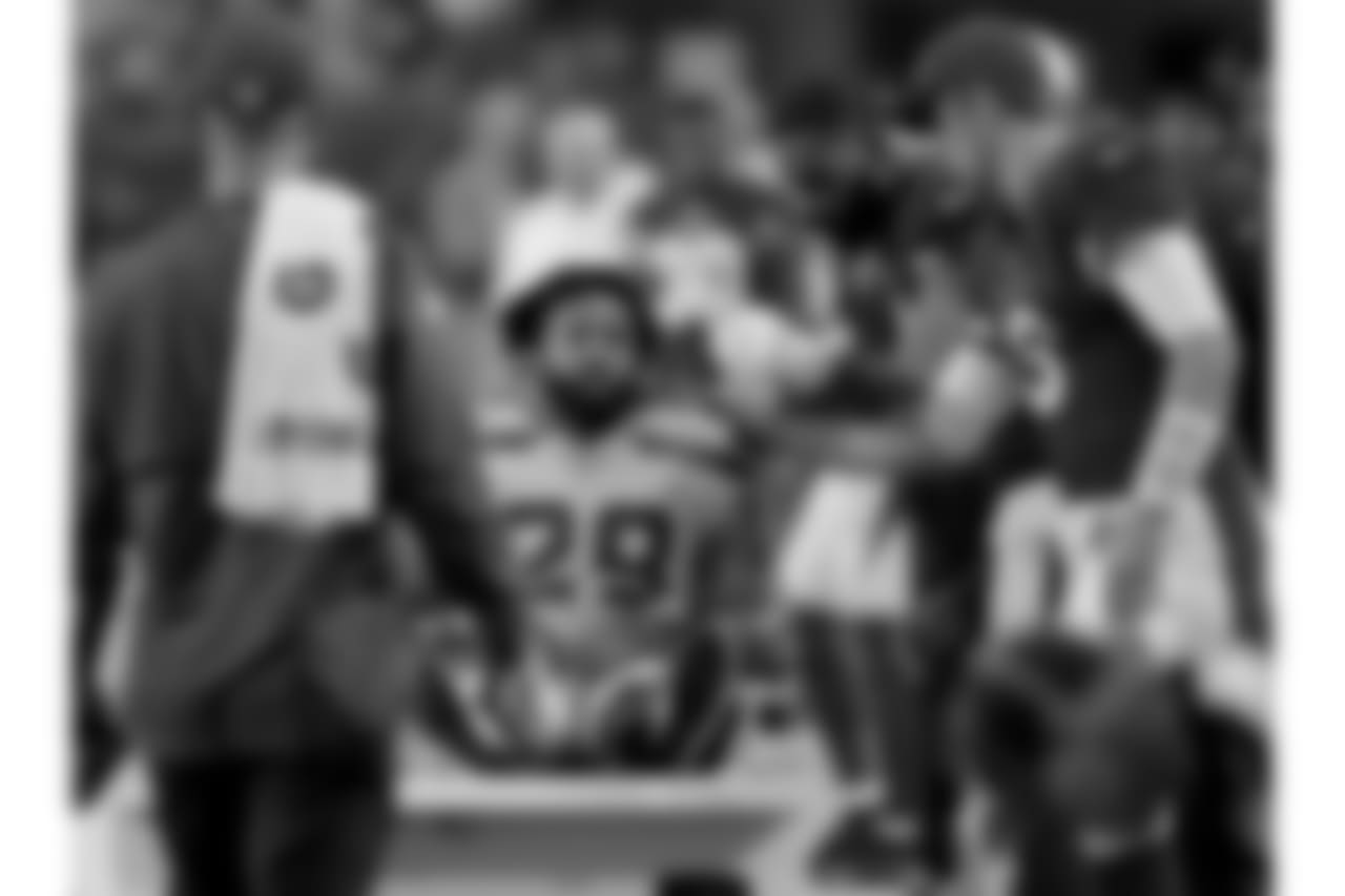 Seattle Seahawks defensive back Earl Thomas (29) is greeted by Arizona Cardinals players as he leaves the field after breaking his leg during the second half of an NFL football game, Sunday, Sept. 30, 2018, in Glendale, Ariz. The Seahawks won 20-17.