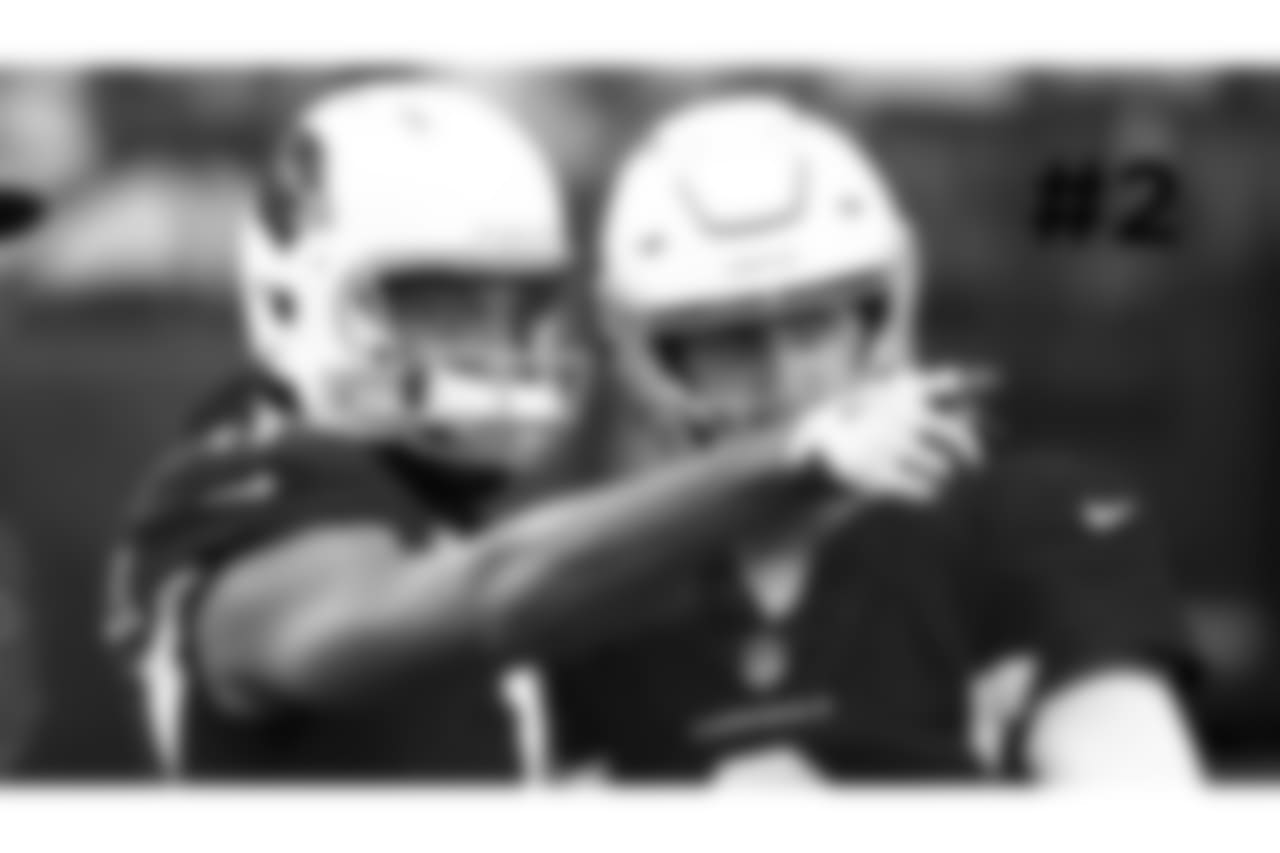 2\. Cardinals wide receiver Larry Fitzgerald (left) and quarterback Josh Rosen talk prior to the game