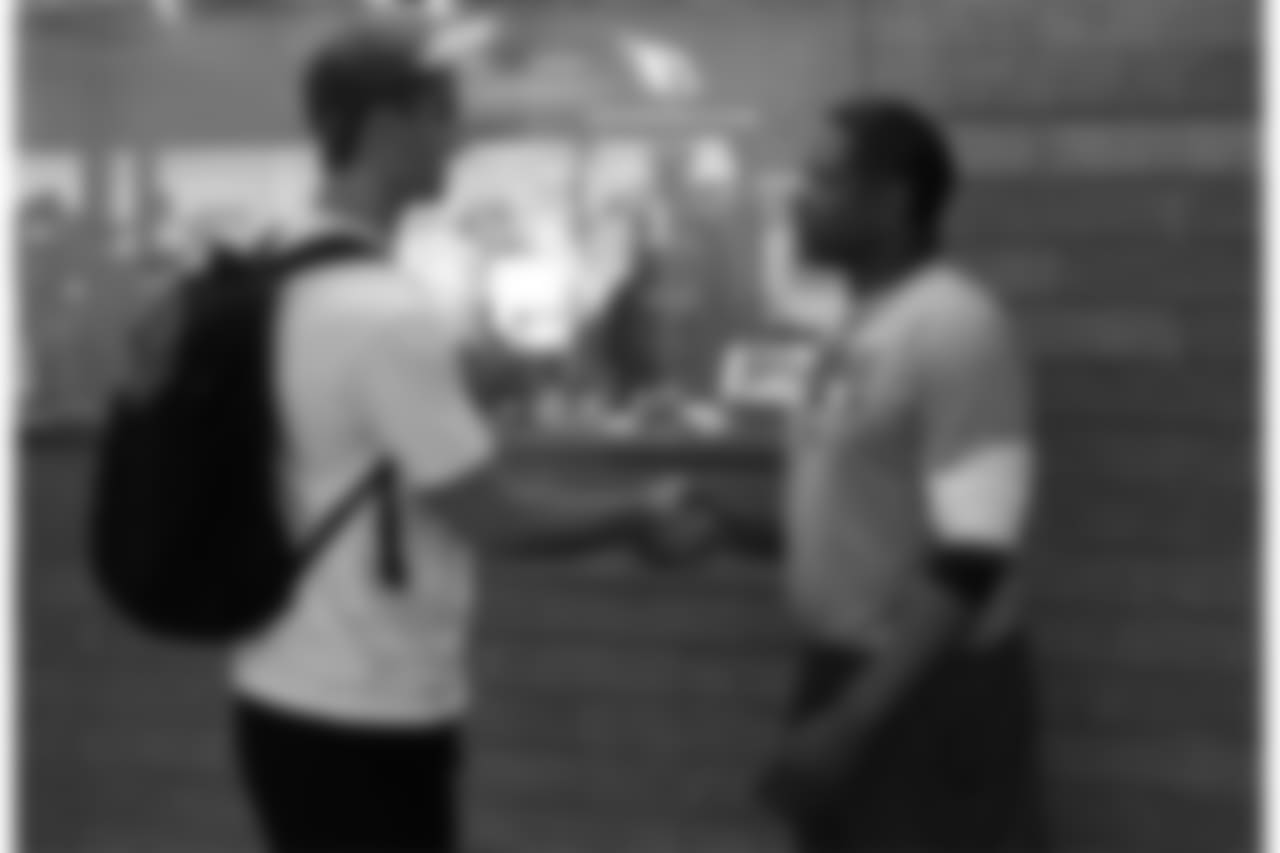 QB Josh Rosen (left) with coach Steve Wilks