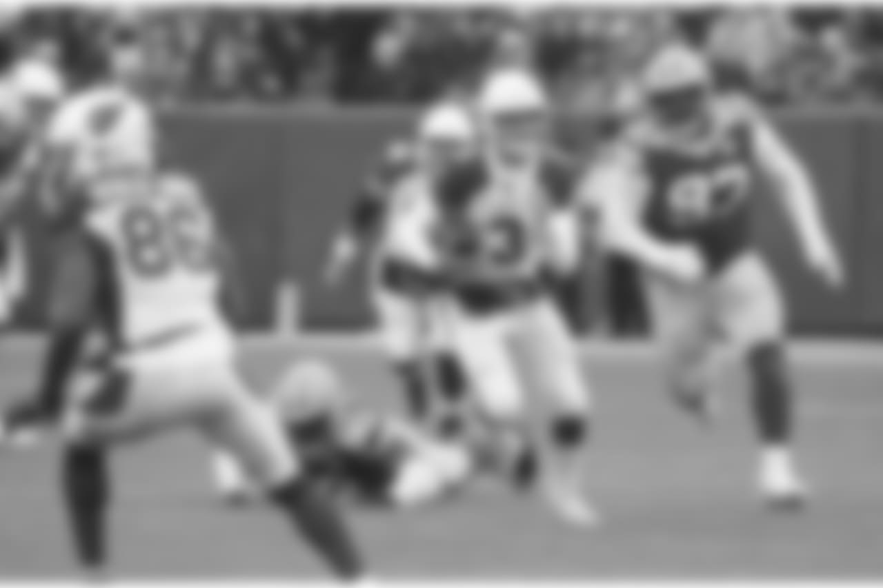 Josh Rosen scrambles