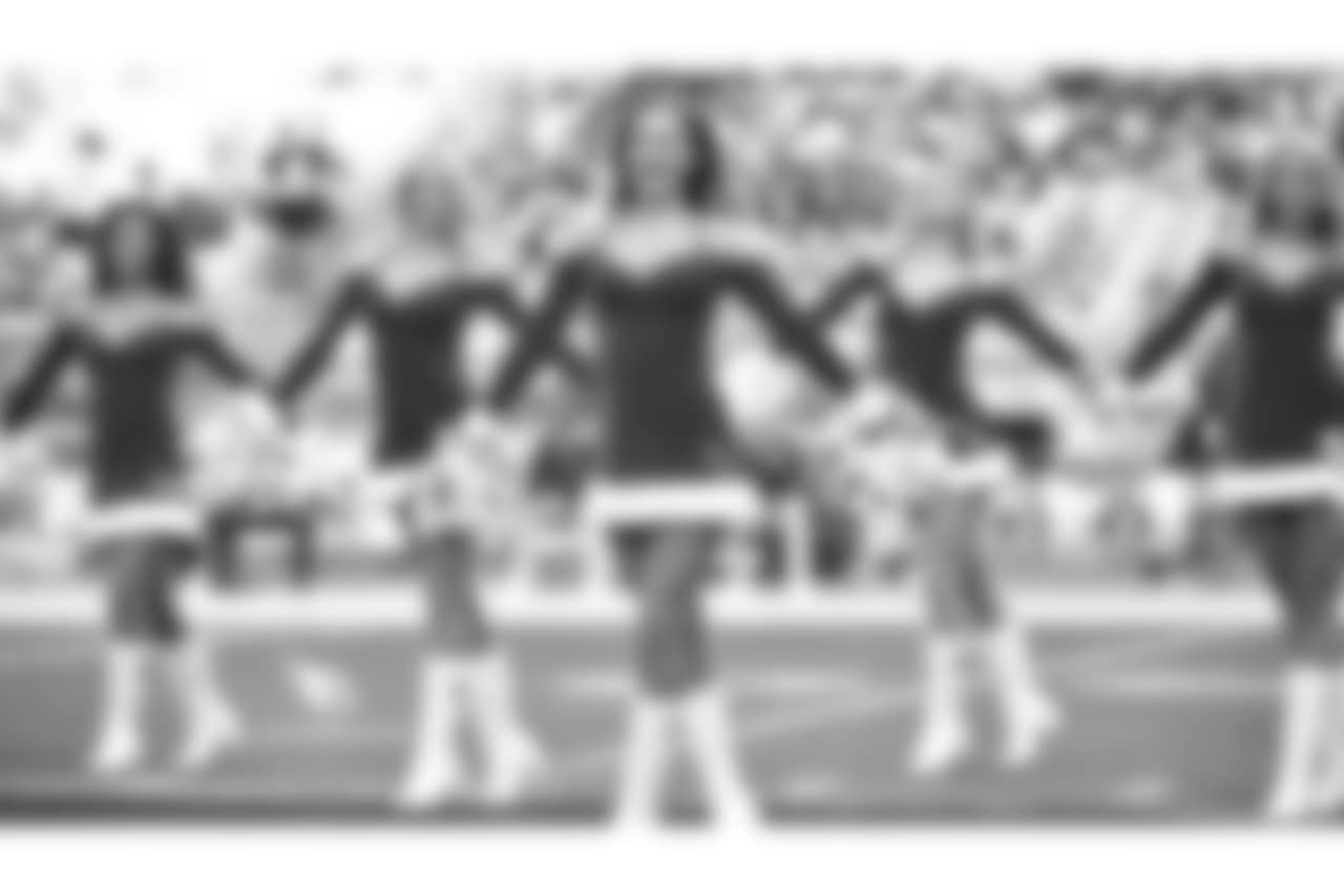Images of the Cardinals cheerleaders during the Week 16 matchup at State Farm Stadium