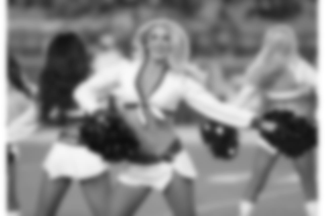 The Arizona Cardinals cheerleaders perform during the first half of an preseason NFL football game against the Los Angeles Chargers, Saturday, Aug. 11, 2018, in Glendale, Ariz. (AP Photo/Rick Scuteri)