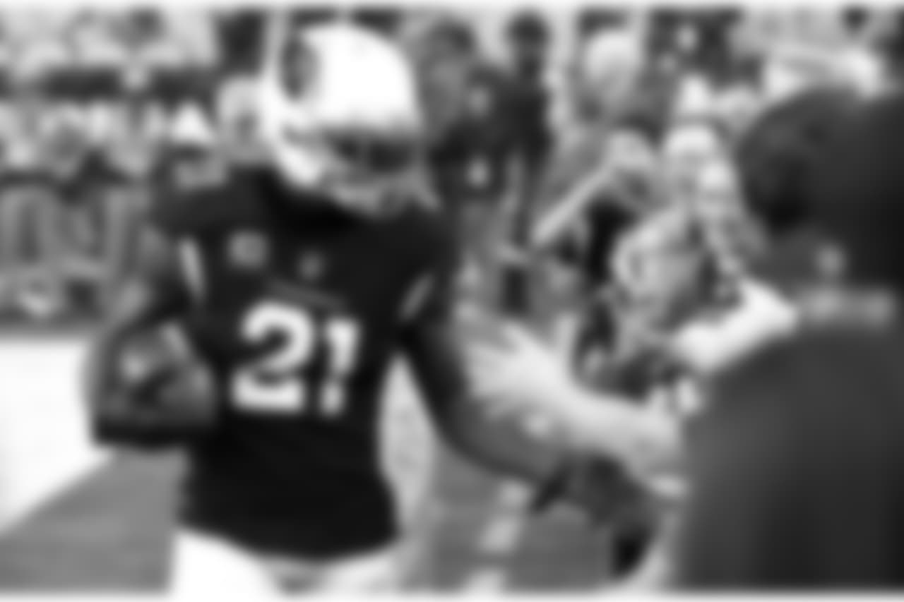 Arizona Cardinals cornerback Patrick Peterson (21) greets fans prior to an NFL football game against the Detroit Lions, Sunday, Dec. 9, 2018, in Glendale, Ariz.