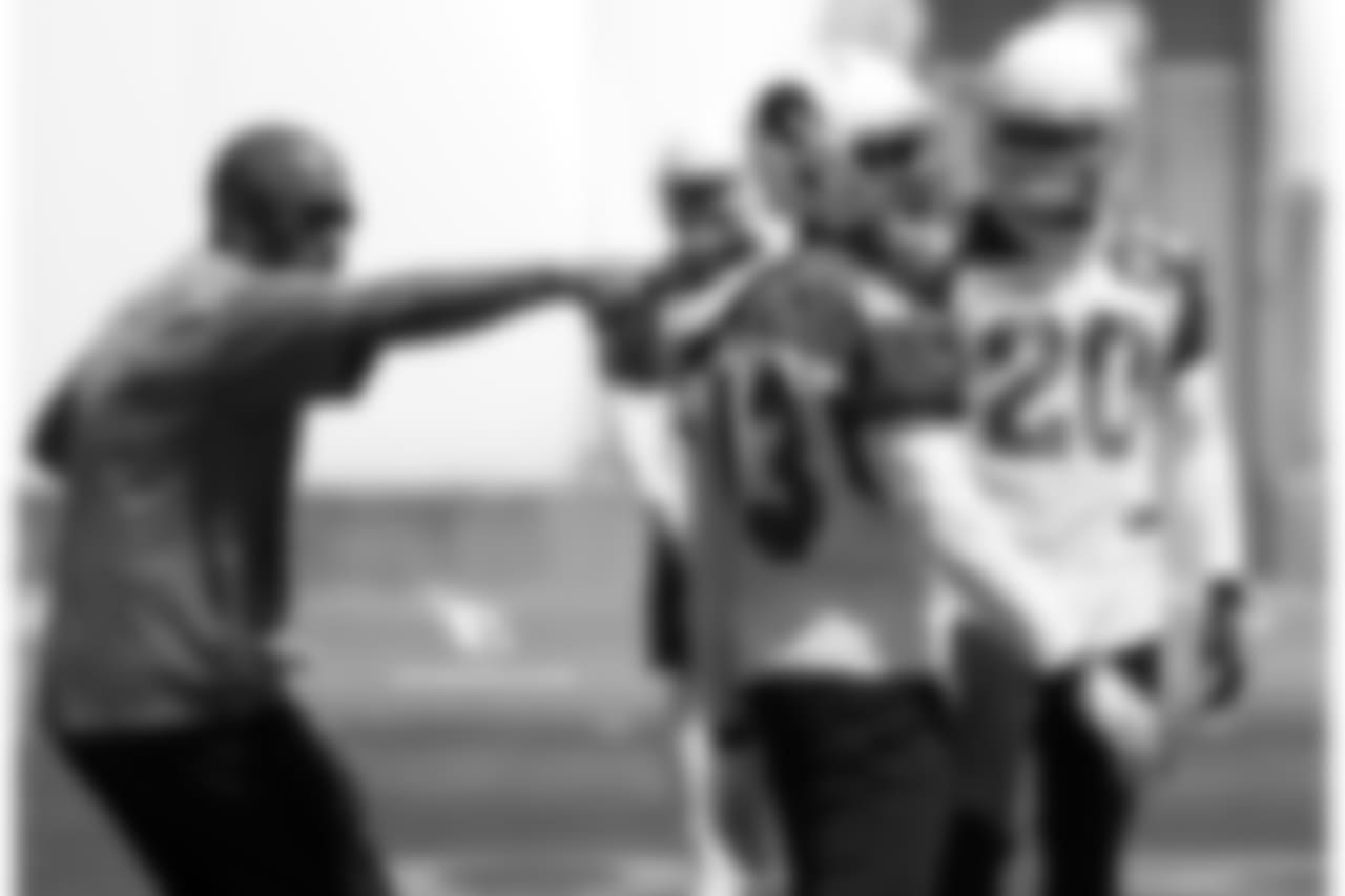 LB coach Larry Foote (left) with LB Haason Reddick
