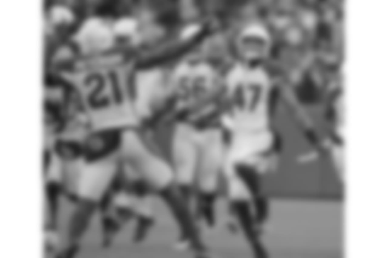 Arizona Cardinals players celebrate a win after a last minute missed field goal by the Green Bay Packers during the second half of an NFL football game Sunday, Dec. 2, 2018, in Green Bay, Wis. Arizona won 20-17.