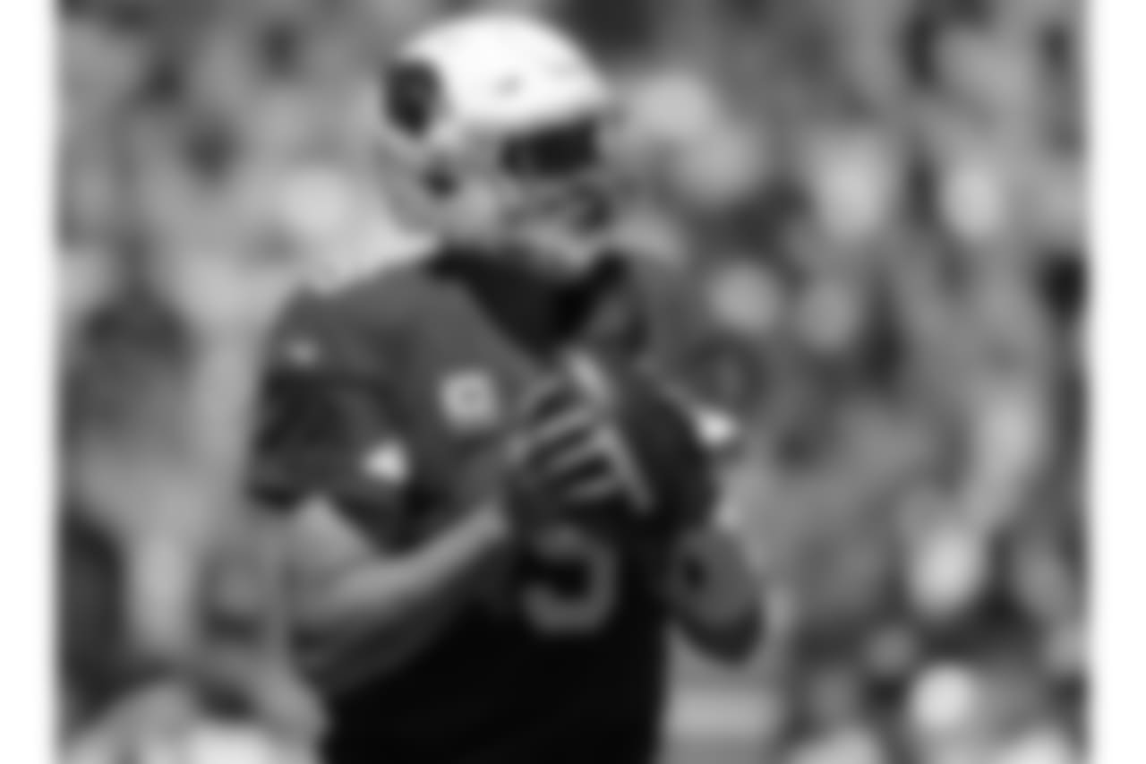 Arizona Cardinals quarterback Sam Bradford looks too pass against the Los Angeles Rams during the first half of an NFL football game Sunday, Sept. 16, 2018, in Los Angeles.