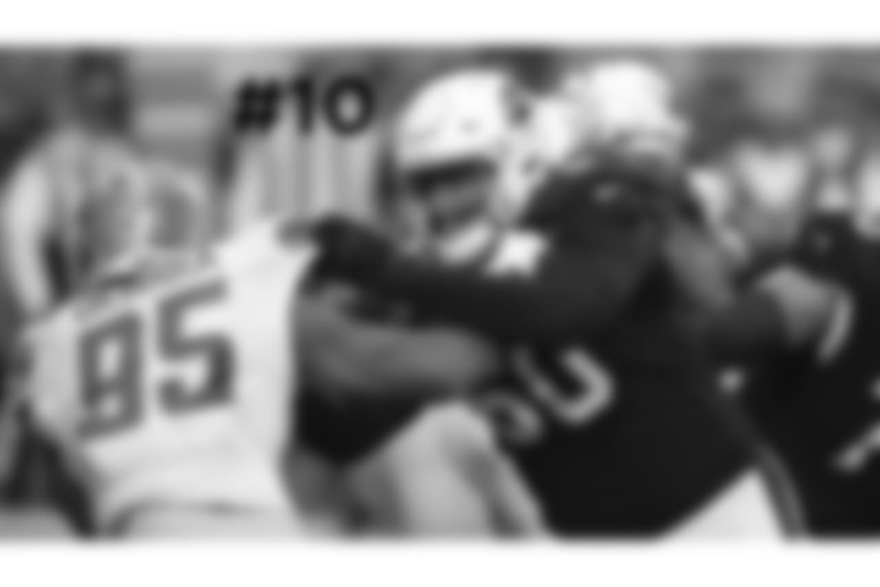 10\. Cardinals right tackle Joe Barksdale battles against Detroit Lions defensive end Romeo Okwara