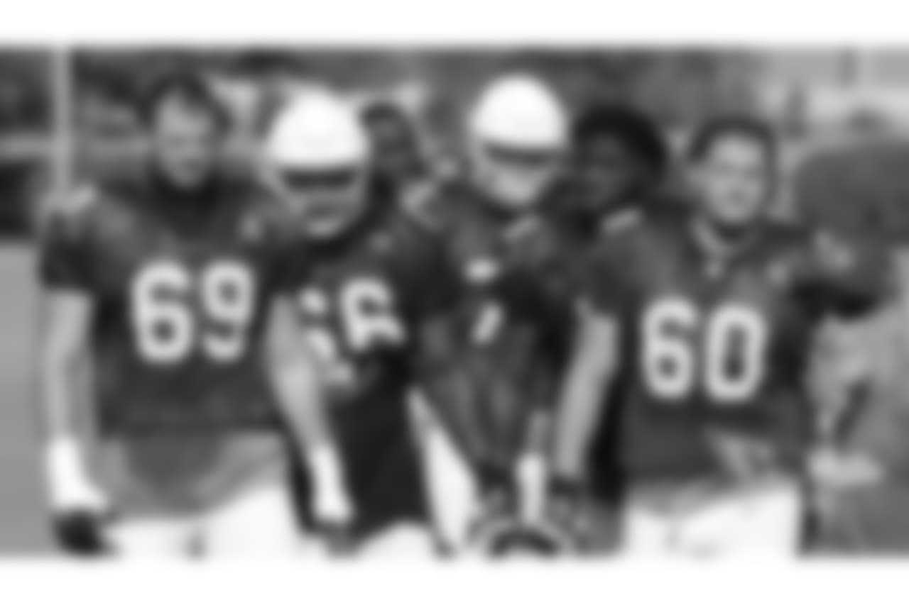 Offensive linemen ready for the next part of practice.