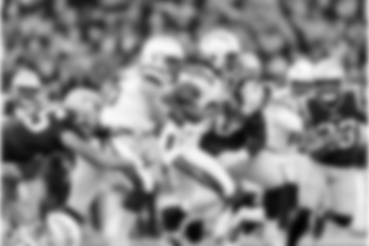 Melvin Gordon runs downfield during the Divisional Round matchup against the New England Patriots at Gillette Stadium.