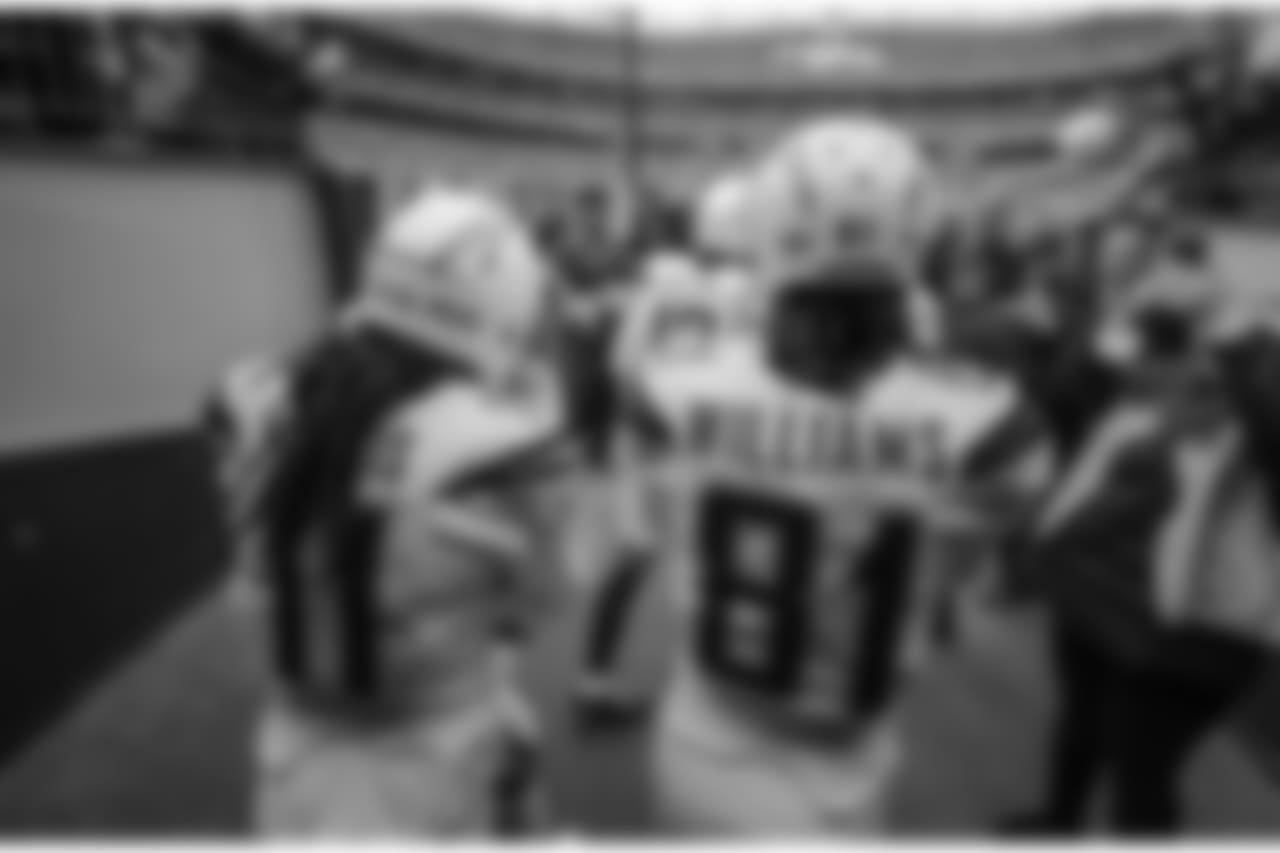 Geremy Davis and Mike Williams walk out to the field to warm up before the Week 17 contest against the Denver Broncos.